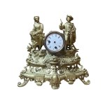 Table clock featuring a "Pair of Villanelli" in gilded metal - 19th century