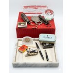 A lot of mid-20th-century desk accessories and curiosities, including a vintage pen and metal items