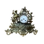 Table clock featuring "Musician and Dancer" in gilded metal - 19th century