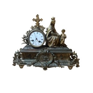 Horloge de table représentant la « Vierge à l'Enfant » en métal bruni et doré - XIXe siècle