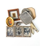 A collection of vintage decorative and devotional items, including mirrors and religious picture frames