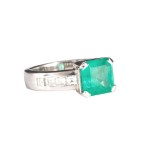 Ring with an emerald and diamonds, contemporary