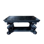 A table supported by four dragon-shaped legs, 19th century.