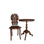 A chair with an openwork backrest and a tea table (piecrusttable), 19th century