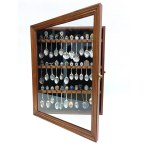 Set of 36 collectible teaspoons in a glass display case (USA/France)