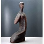 A clay sculpture of a woman from the Jihokera Bechyne studio in the 1960s