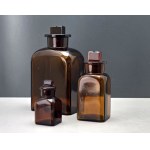 Set of three amber glass pharmacy bottles — second half of the 20th century