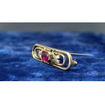 Antique Art Deco brooch with a ruby center stone—first half of the 20th century