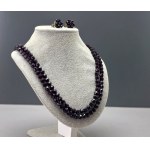 Double-strand necklace and clips made of burgundy Jablonex glass crystals—1970s