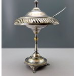 An eclectic silver-plated sugar bowl on a foot with an openwork pattern—first half of the 20th century