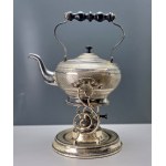 Ornate silver-plated bulier with a heater—tea kettle—first half of the 20th century