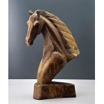 A wooden sculpture of a horse
