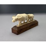 Hand-carved buffalo figurine made of bone—first half of the 20th century