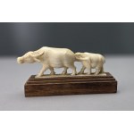 Hand-carved buffalo figurine made of bone—first half of the 20th century
