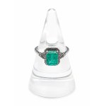 Ring with diamonds and an emerald