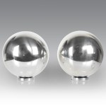 Pair of Rita Jordens decorative spheres in nickel-plated steel (Ø 20 cm)