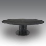 Large round slate table with a center light fixture