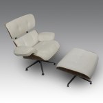 Charles & Ray Eames (design by) Armchair and footrest, made in Italy