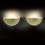 Two brass wall sconces