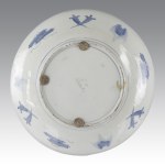 Pair of large Chinese Imari plates with floral motifs and anthropomorphic figures