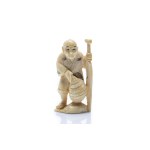 NETSUKE OF BOATMAN WITH OAR AND BASKET "SENDŌ" | JAPAN