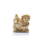NETSUKE OF MAN WITH SAKE BOTTLE "HYŌTAN" | JAPAN