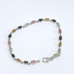 Silver bracelet with multiple natural stones