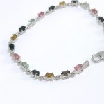 Silver bracelet with multiple natural stones