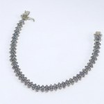 Silver chevron bracelet with natural tanzanites