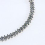 Silver chevron bracelet with natural tanzanites