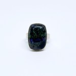 Silver ring with a black Solid opal