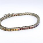 Silver bracelet with natural garnets, peridots, citrines, and amethysts