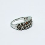 Silver ring with natural andalusites