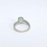 Silver ring with natural green and white sapphires