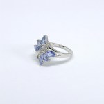 Silver ring with natural tanzanites and white sapphires