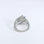 Silver ring with natural tanzanites and white sapphires