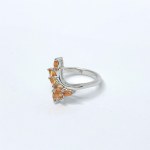 Silver ring with natural orange sapphires
