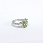 Silver ring with natural peridots and white sapphires