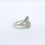 Silver ring with natural blue and white topazes