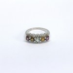 Silver ring with natural garnets, citrines, white topazes, and aquamarine