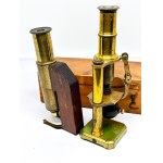 Two antique brass microscopes, one in a box