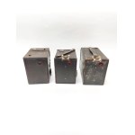 Three Kodak Brownie cameras—the Popular Brownie, the Six-20 Brownie Junior, and the Portrait Brownie