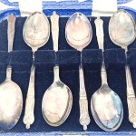 Set of Spoons with a Monk Design, Silver-Plated, in a Box