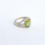 Silver ring with a natural peridot