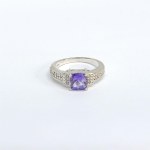 Silver ring with natural amethyst and white sapphires