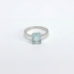 Silver ring with a natural topaz