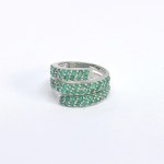 Silver ring with natural emeralds