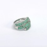 Silver ring with natural emeralds