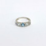 Silver ring with natural aquamarines, topaz, and tanzanites