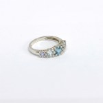 Silver ring with natural aquamarines, topaz, and tanzanites